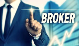 Broker touchscreen is operated by businessman